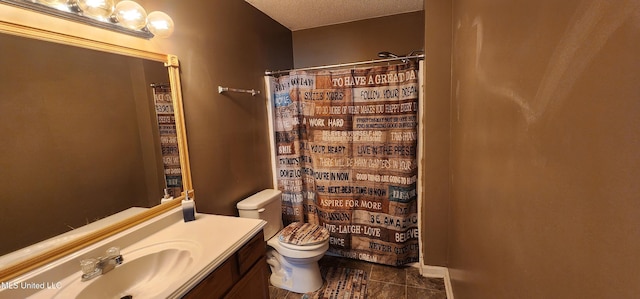 full bath with vanity, curtained shower, tile patterned floors, a textured ceiling, and toilet