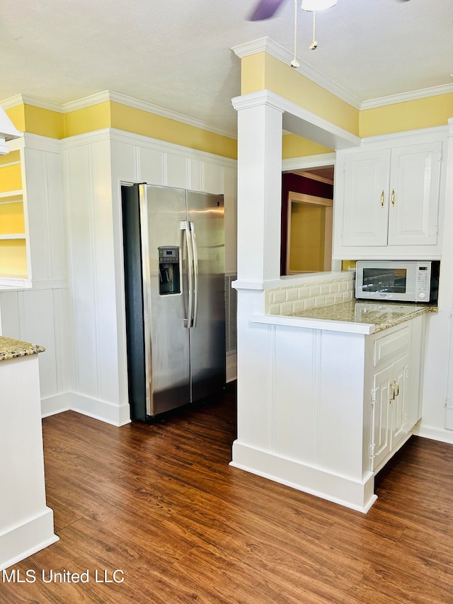 kitchen featuring dark hardwood / wood-style flooring, stainless steel fridge with ice dispenser, white cabinetry, and ceiling fan