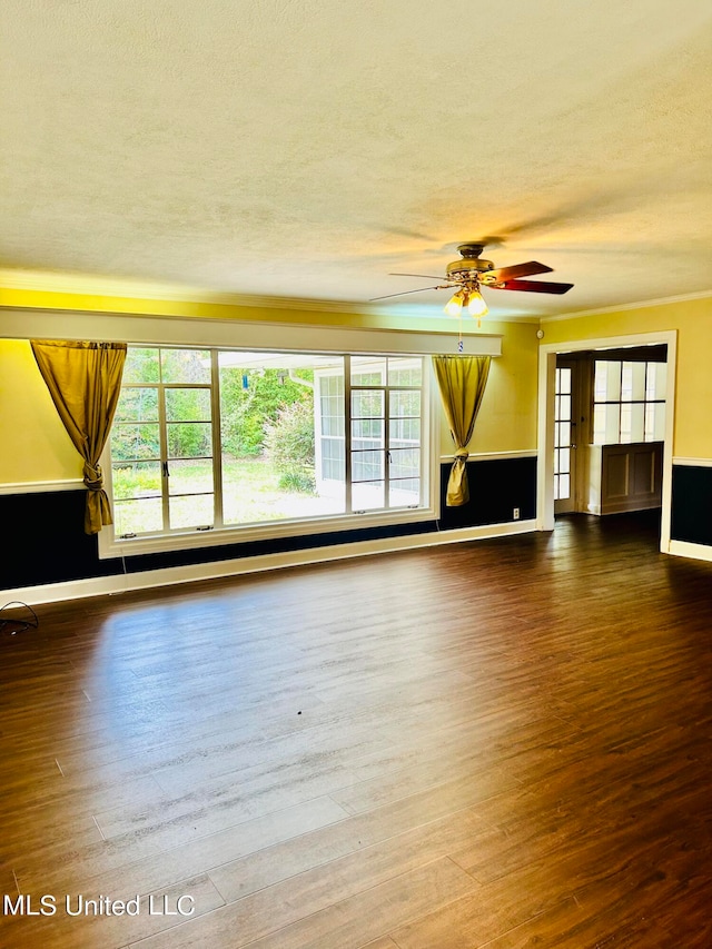 unfurnished living room with hardwood / wood-style floors, a textured ceiling, and ceiling fan