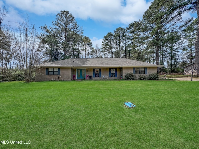 ranch-style home with a front lawn