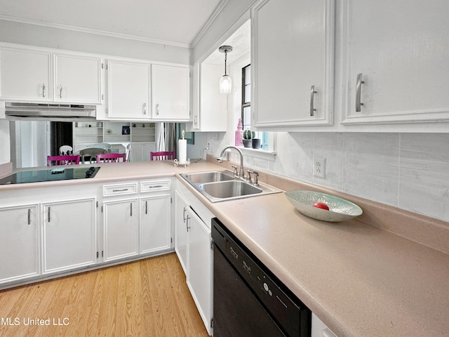 kitchen with white cabinetry, black appliances, sink, and pendant lighting