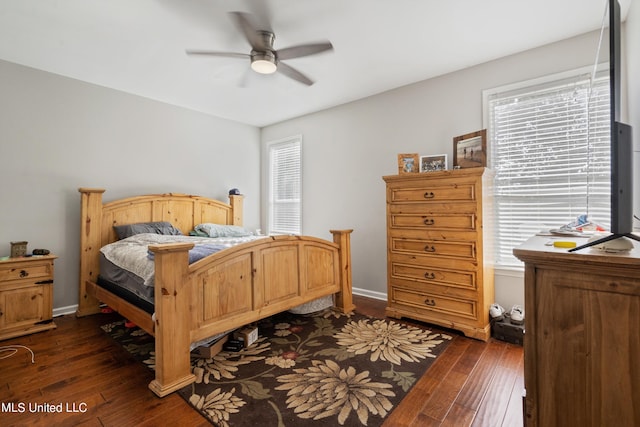 bedroom featuring ceiling fan and dark hardwood / wood-style flooring