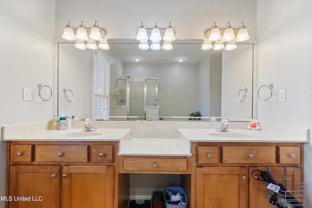 bathroom with vanity and an enclosed shower