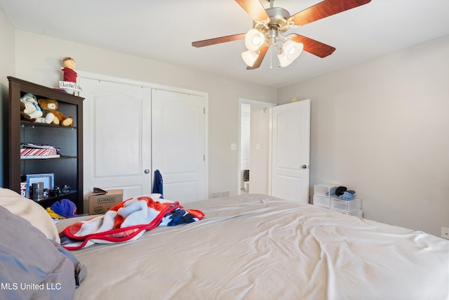 bedroom with a closet and ceiling fan