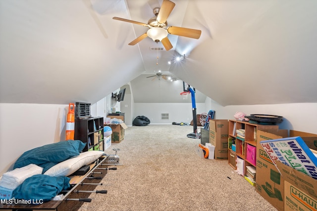 bonus room featuring carpet, vaulted ceiling, and ceiling fan