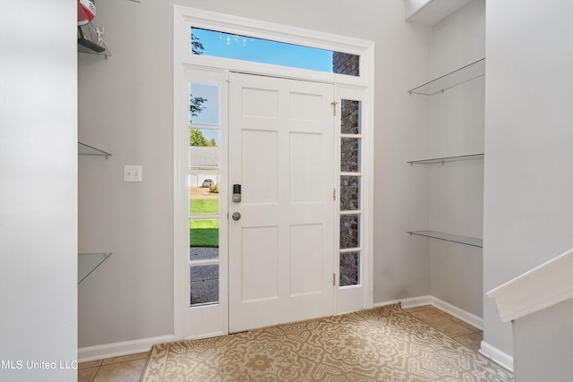 view of tiled foyer entrance