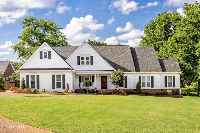 9194 Rosalie Cv, Olive Branch, MS 38654 - view of front of house featuring covered porch and a front lawn