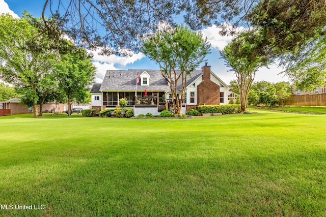 9194 Rosalie Cv, Olive Branch, MS 38654 - cape cod home featuring a sunroom and a chimney