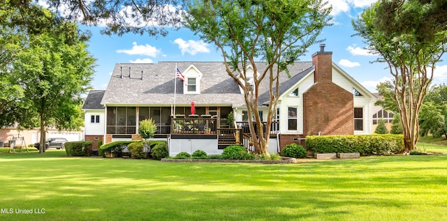 9194 Rosalie Cv, Olive Branch, MS 38654 - back of property featuring a sunroom, brick siding, a yard, a deck, and stairway