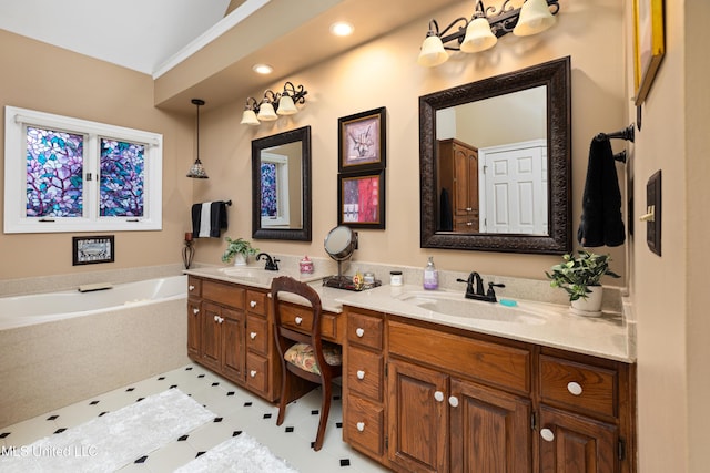 9194 Rosalie Cv, Olive Branch, MS 38654 - bathroom with double vanity, a garden tub, and recessed lighting