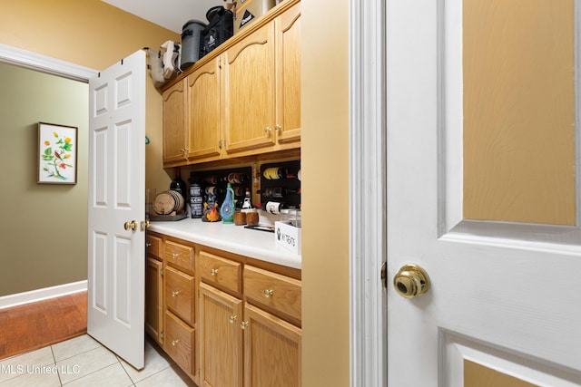 9194 Rosalie Cv, Olive Branch, MS 38654 - bar area with light tile patterned flooring