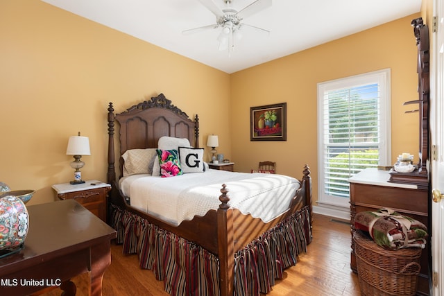 9194 Rosalie Cv, Olive Branch, MS 38654 - bedroom featuring wood finished floors and a ceiling fan