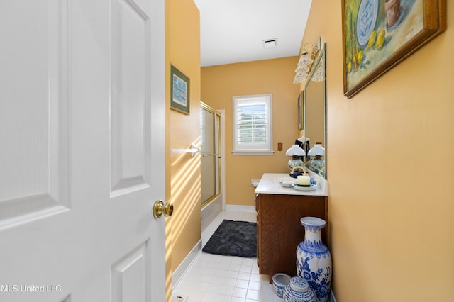 9194 Rosalie Cv, Olive Branch, MS 38654 - bathroom with vanity and tile patterned flooring