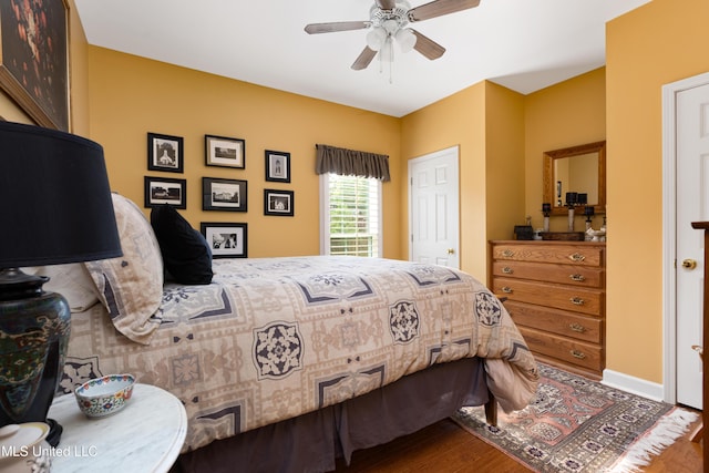 9194 Rosalie Cv, Olive Branch, MS 38654 - bedroom featuring wood finished floors and a ceiling fan