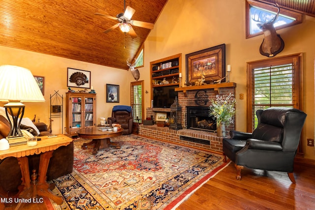 9194 Rosalie Cv, Olive Branch, MS 38654 - living area with wooden ceiling, hardwood / wood-style floors, high vaulted ceiling, a brick fireplace, and ceiling fan