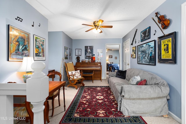 9194 Rosalie Cv, Olive Branch, MS 38654 - carpeted living room with ceiling fan and baseboards