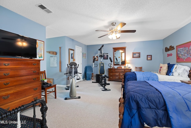 9194 Rosalie Cv, Olive Branch, MS 38654 - bedroom featuring carpet flooring, a textured ceiling, and a ceiling fan