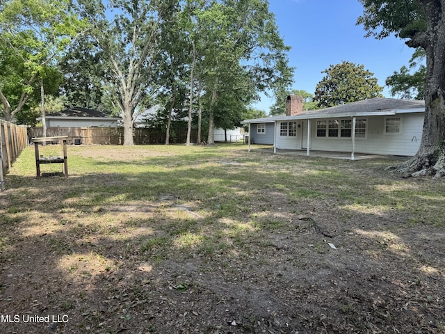 318 E 4th St, Long Beach, MS 39560 - view of yard featuring a patio