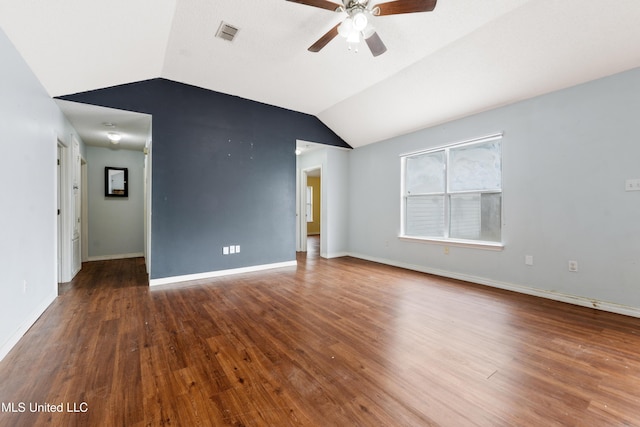 unfurnished room with dark hardwood / wood-style floors, ceiling fan, and lofted ceiling