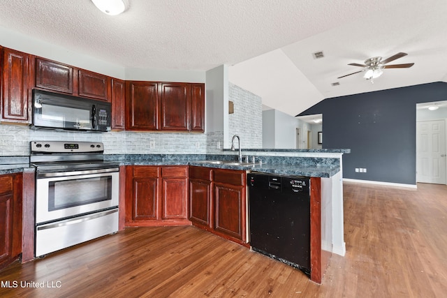 kitchen featuring decorative backsplash, sink, light hardwood / wood-style floors, and black appliances