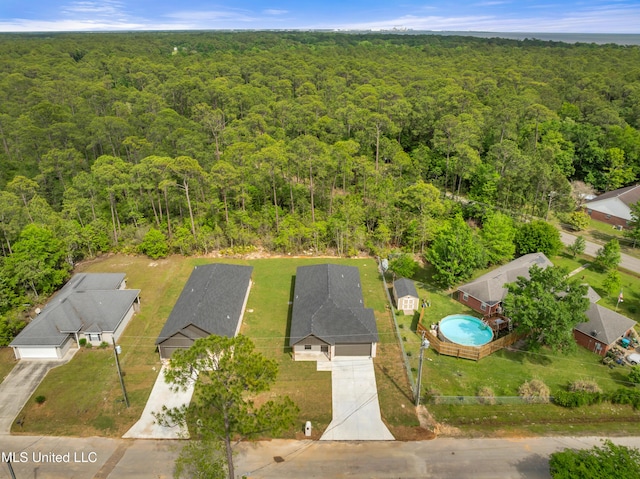 bird's eye view featuring a view of trees
