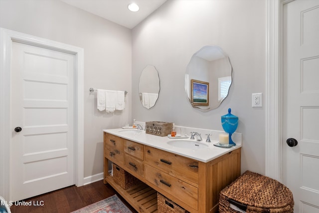 bathroom featuring vanity and hardwood / wood-style flooring