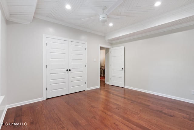 unfurnished bedroom with wood finished floors, baseboards, recessed lighting, and crown molding