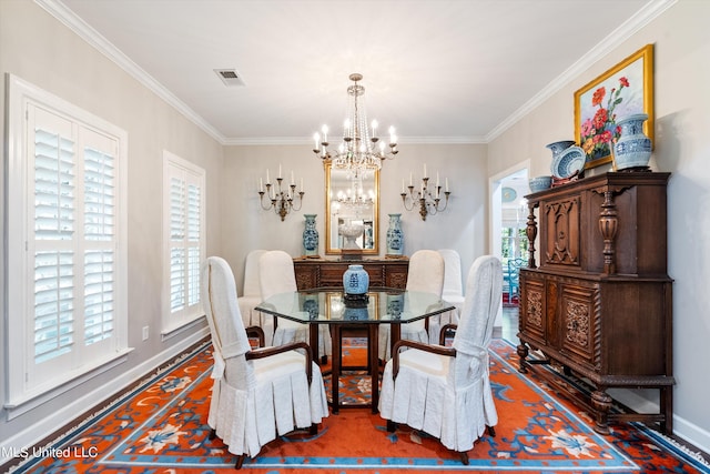dining space with plenty of natural light, visible vents, crown molding, and an inviting chandelier