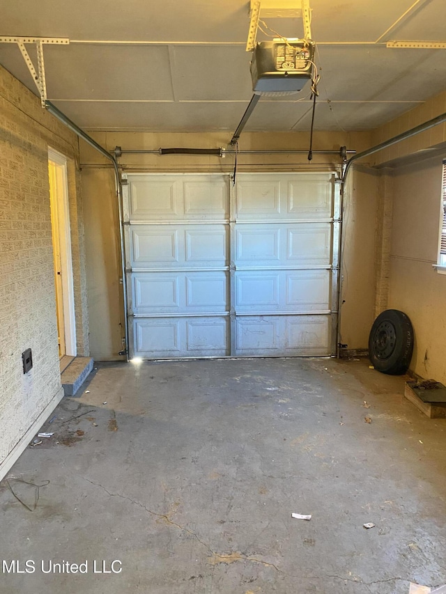 garage featuring a garage door opener