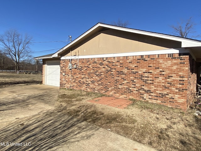 view of home's exterior featuring a garage