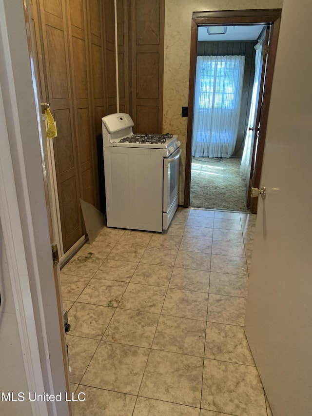 washroom with light colored carpet