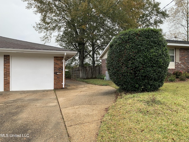 view of yard with a garage