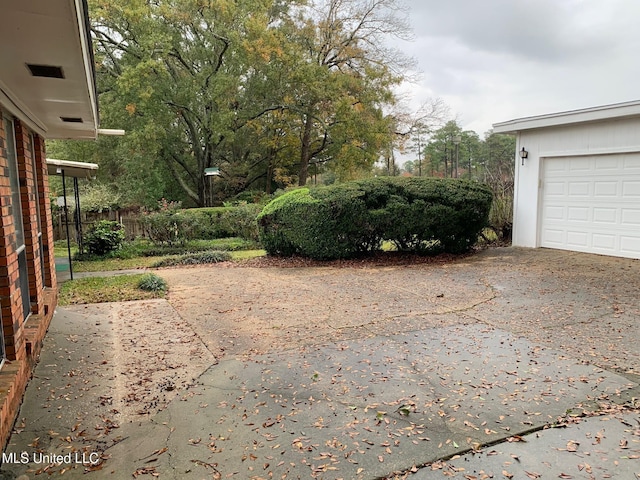 view of yard with a garage