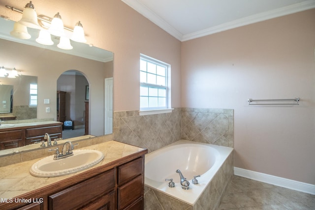 bathroom featuring tile patterned flooring, vanity, a relaxing tiled tub, and crown molding