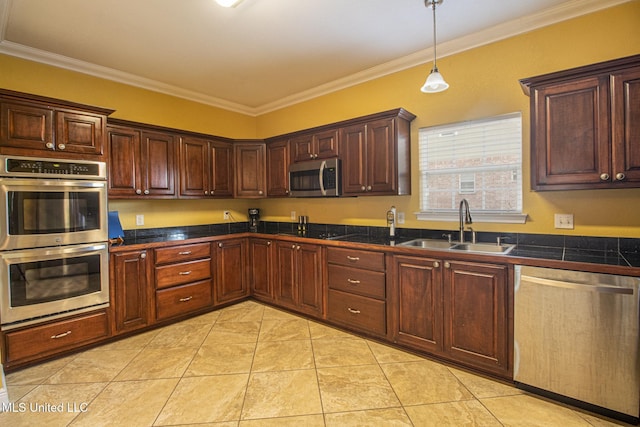 kitchen featuring sink, hanging light fixtures, stainless steel appliances, light tile patterned floors, and ornamental molding