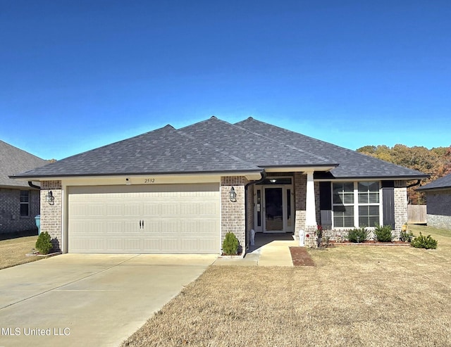 prairie-style home with a garage