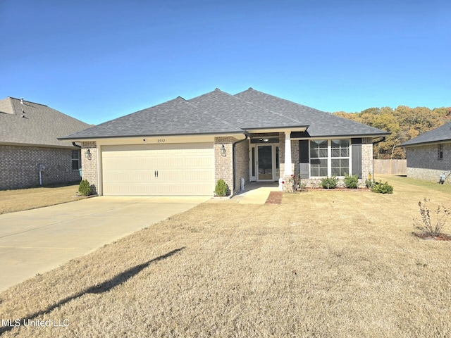 prairie-style home with a garage