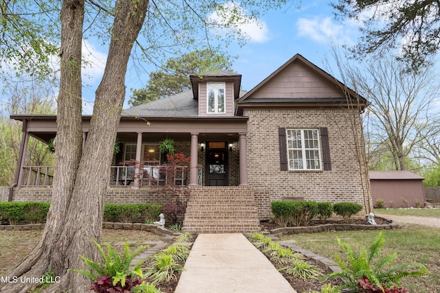 view of front of property featuring covered porch