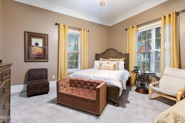 carpeted bedroom with crown molding