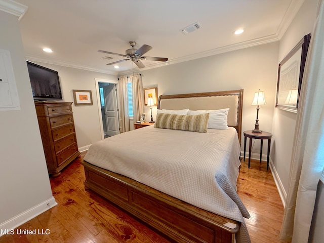 2997 Deerfield Rd, Yazoo City, MS 39194 - bedroom with baseboards, light wood-type flooring, ornamental molding, recessed lighting, and a ceiling fan