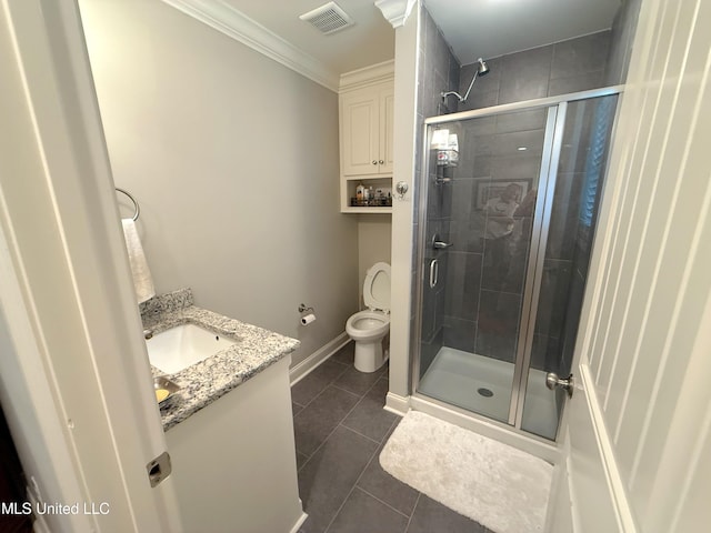 2997 Deerfield Rd, Yazoo City, MS 39194 - bathroom featuring tile patterned floors, vanity, a stall shower, toilet, and crown molding