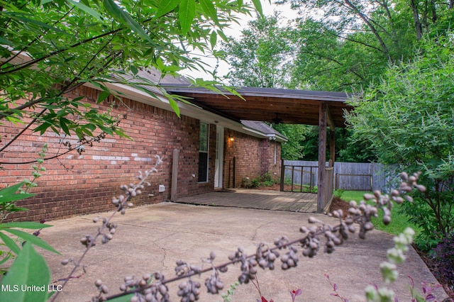view of patio / terrace featuring fence