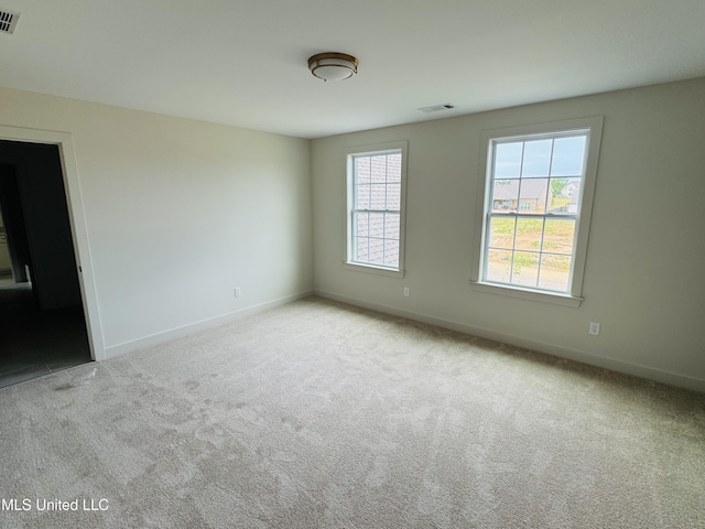 9549 Mcelroy Farms Dr, Olive Branch, MS 38654 - spare room with carpet flooring and baseboards