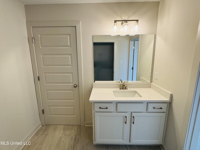 9549 Mcelroy Farms Dr, Olive Branch, MS 38654 - bathroom with vanity and baseboards