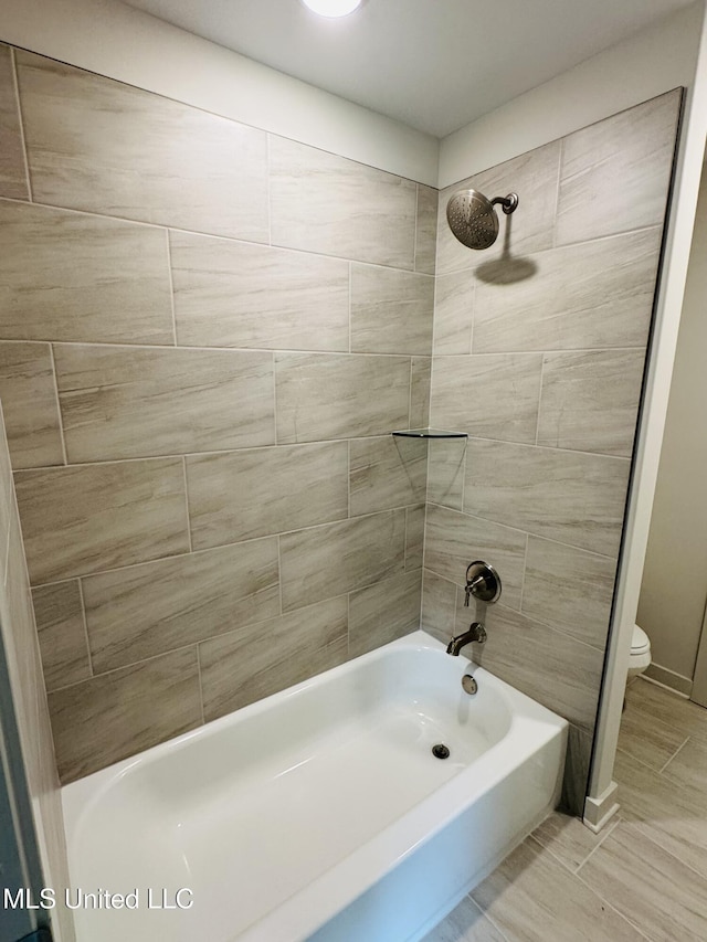 9549 Mcelroy Farms Dr, Olive Branch, MS 38654 - full bathroom with toilet and tub / shower combination