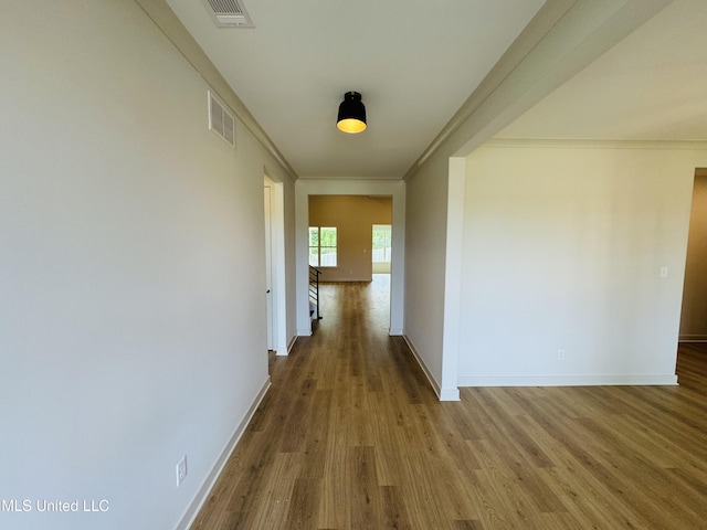 9549 Mcelroy Farms Dr, Olive Branch, MS 38654 - hall featuring wood finished floors, baseboards, and ornamental molding