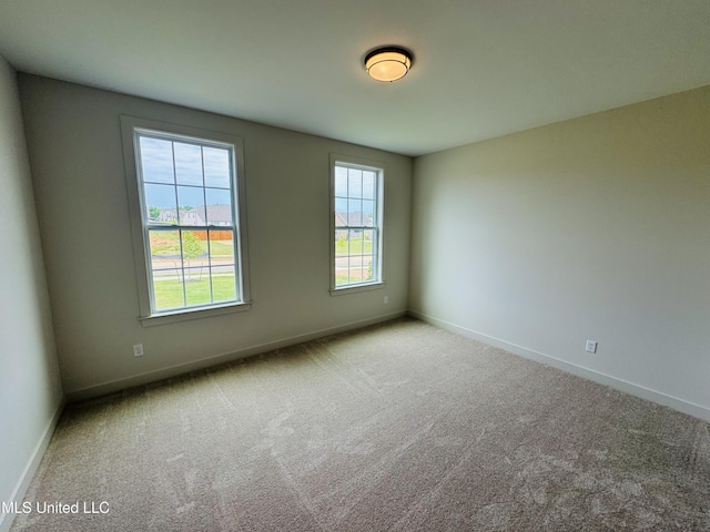 9549 Mcelroy Farms Dr, Olive Branch, MS 38654 - carpeted empty room with baseboards