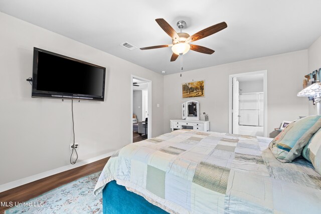 13400 Willow Oak Cir, Gulfport, MS 39503 - bedroom featuring wood finished floors, baseboards, and ceiling fan