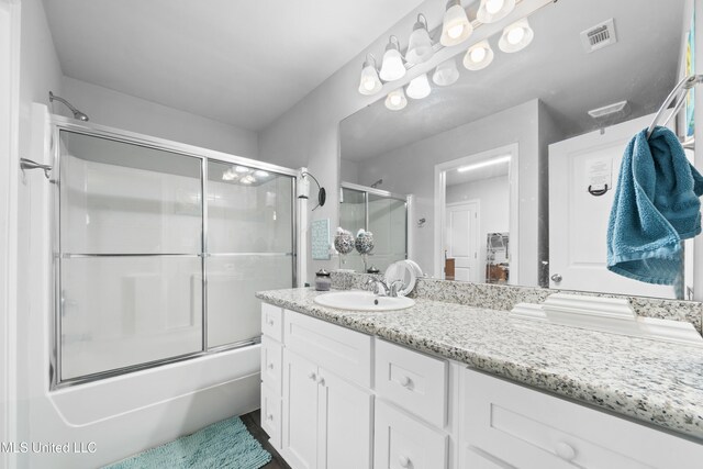 13400 Willow Oak Cir, Gulfport, MS 39503 - full bath with vanity and combined bath / shower with glass door