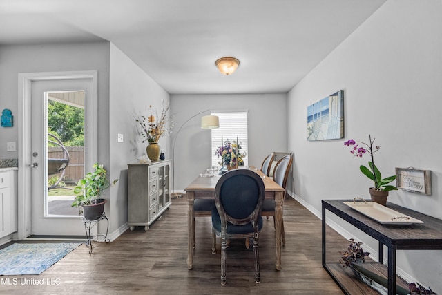 13400 Willow Oak Cir, Gulfport, MS 39503 - dining space with plenty of natural light, dark wood finished floors, and baseboards
